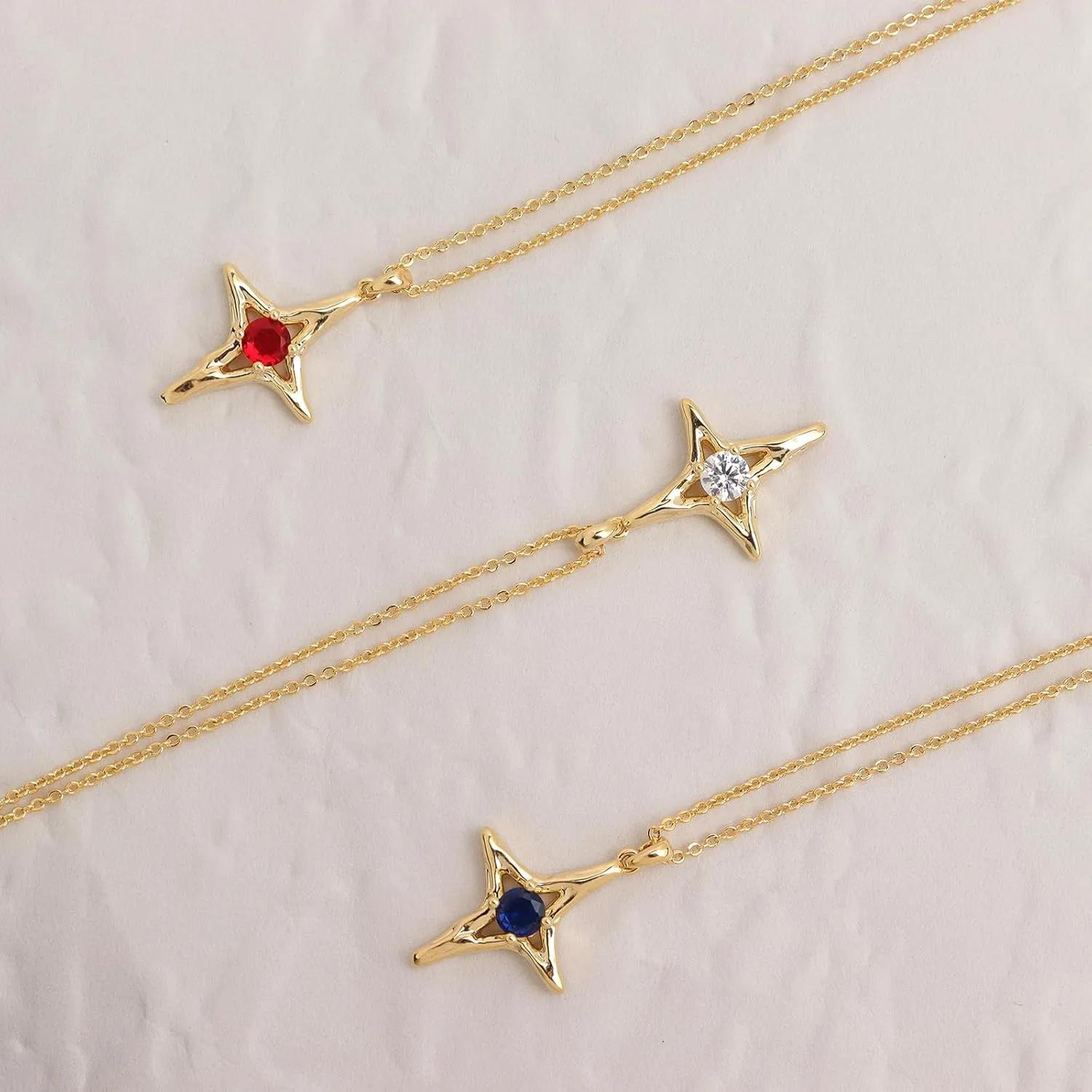 Sonateomber Simple Gold Star Pendant Necklaces for Women Sparkly Rhinestone Birthstone Lucky Four-point Stars Dangle Necklaces Prom Fashion Birthday Jewelry Gift